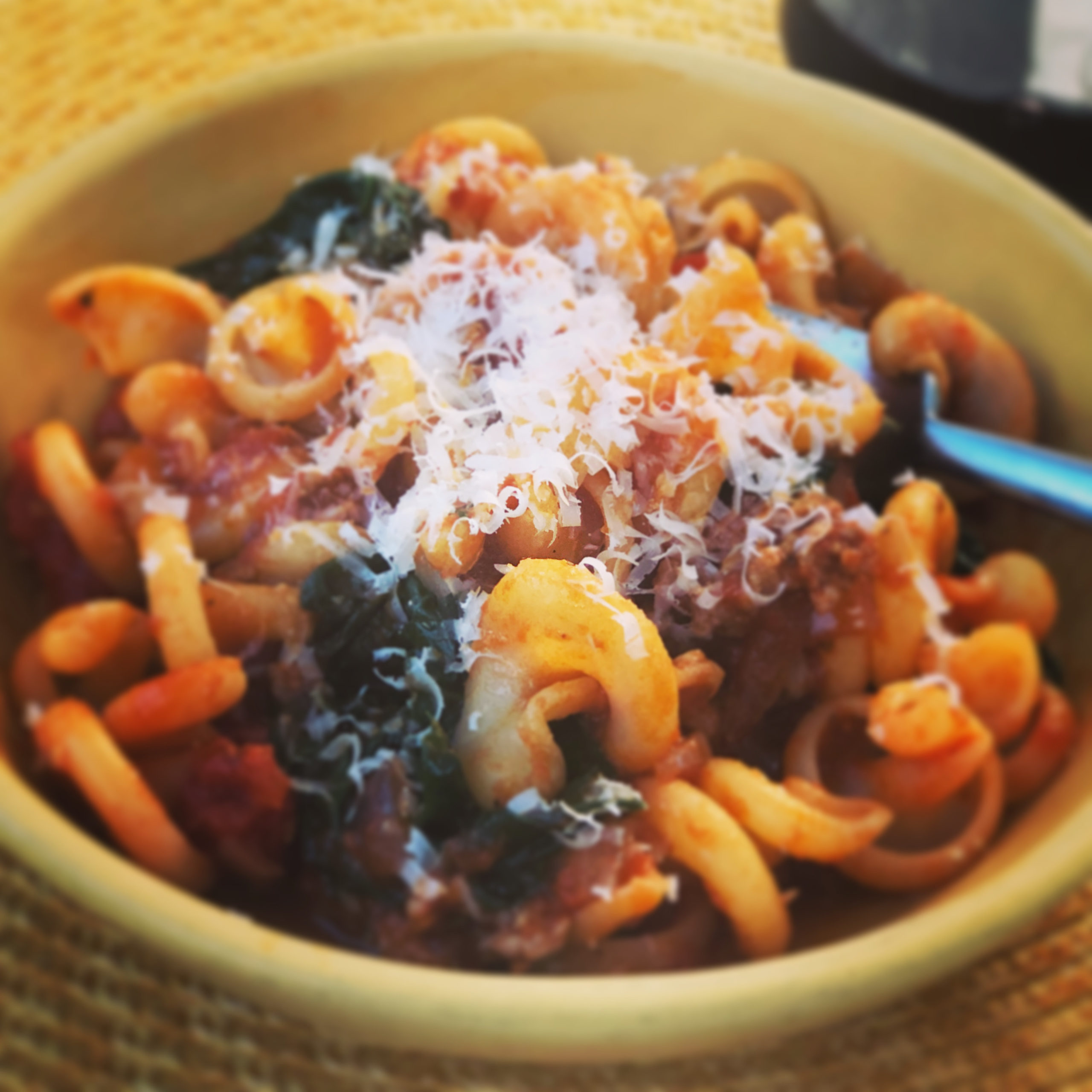 Pantry Pasta with Rao's Arrabbiata, sausage, onion and greens