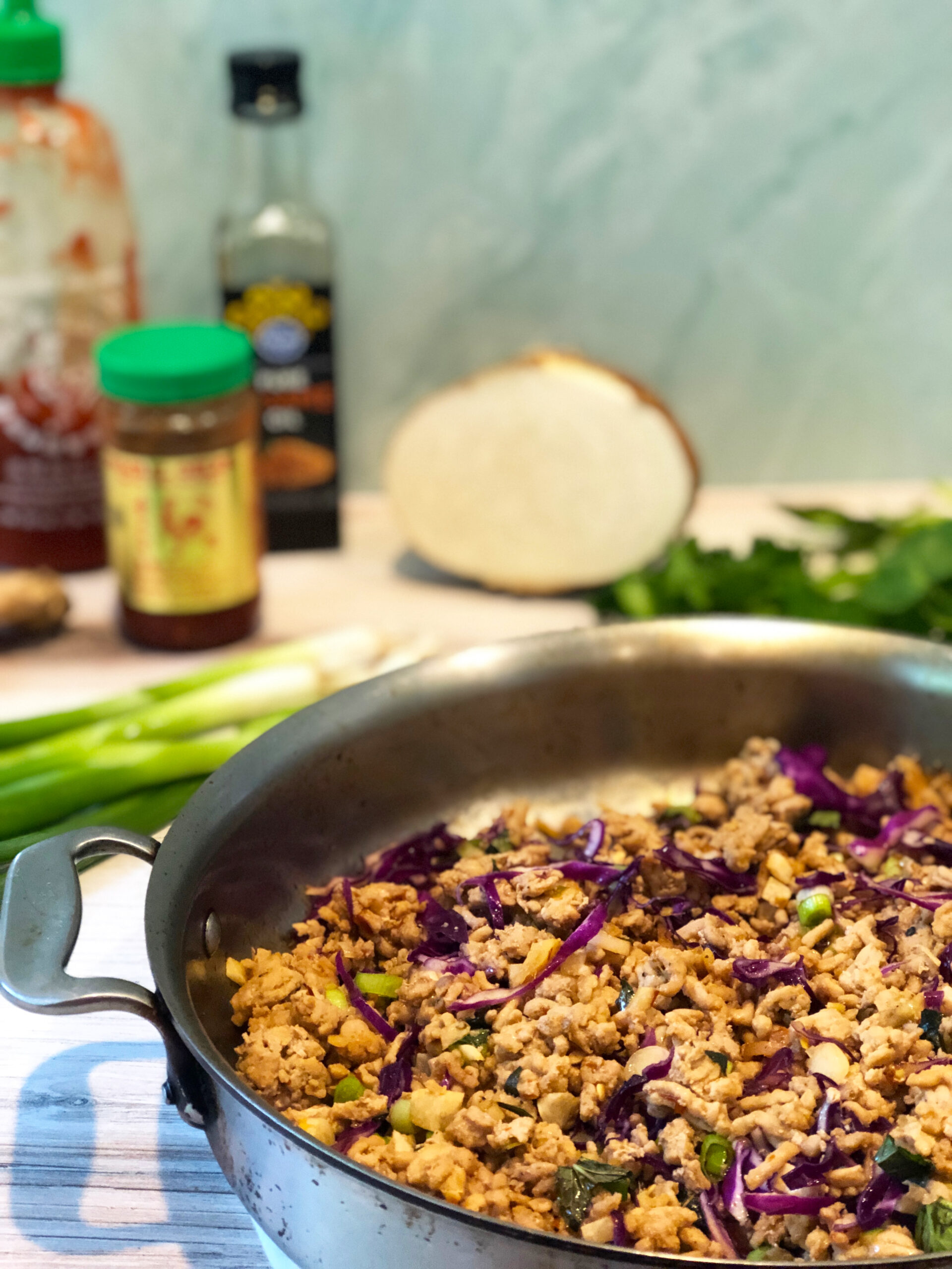 Chicken Lettuce Wraps- chicken in pan with ingredients