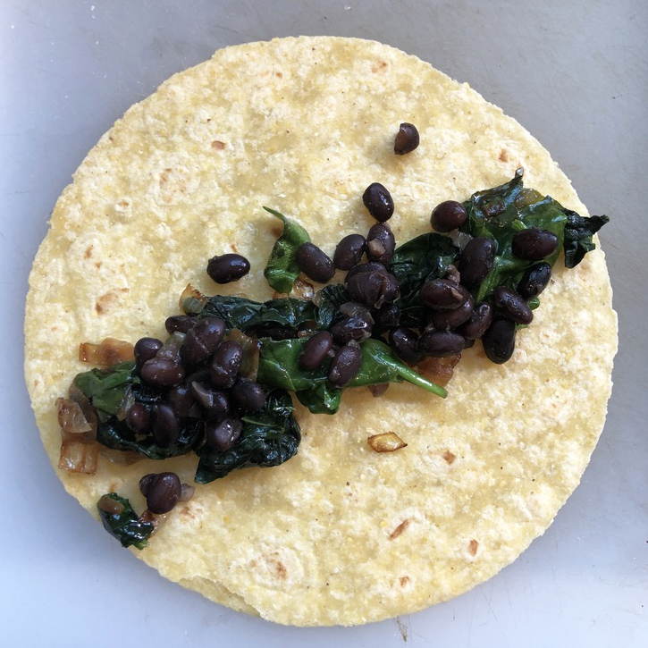 Tortilla with black beans and kale